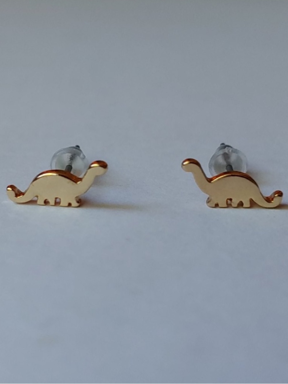 Gold tone dino earrings studs new